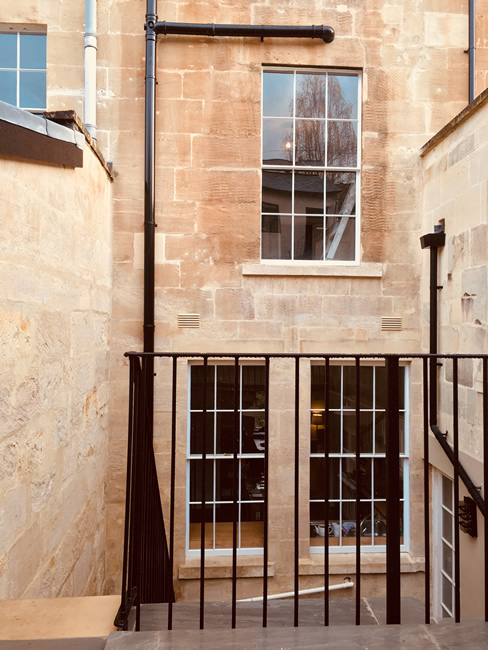 Cleaning a listed building made of Bath stone